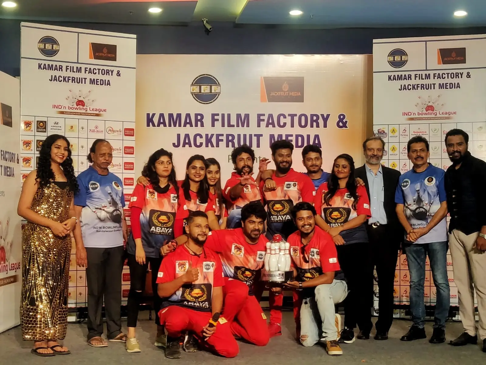 Teams and the winners with the trophy at the Indian Bowling League.